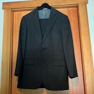 Oscar De La Renta Profile Suit